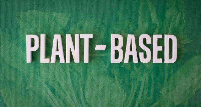 Green image with the text 'plant-based' and images of leaves in background.