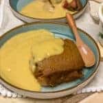 Vegan Eve's pudding served with custard, featured image.