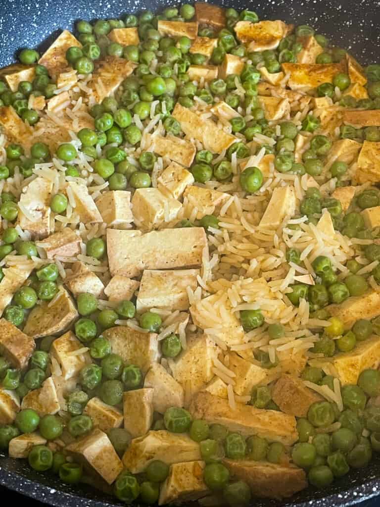 vegan kedgeree finished cooking in the pan ready for the garnishes.