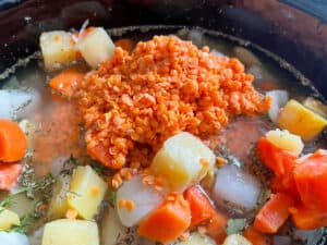 red lentils added to the saucepan.