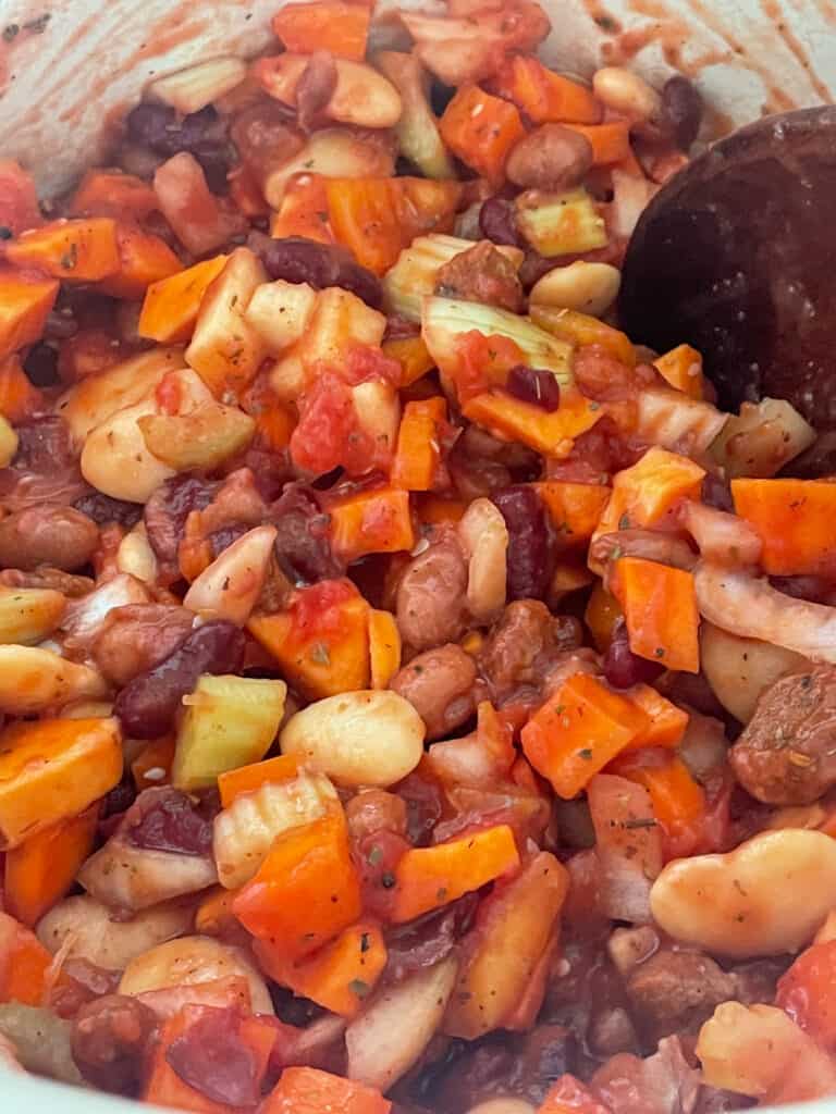 Herbs and chopped tomatoes mixed through the veggies.