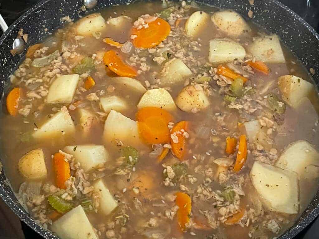 Potatoes added to mince and veggies.