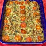 Vegan Hamburger Casserole in blue dish with red background, featured image..