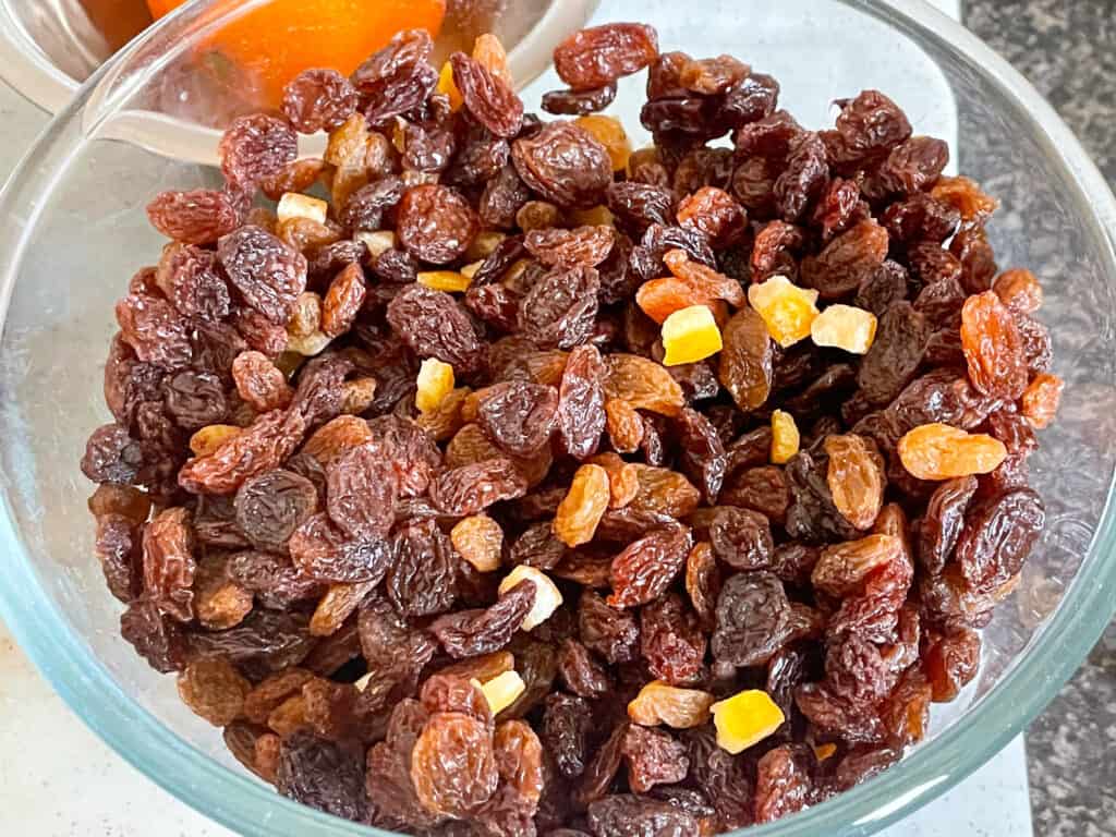 Dried fruit in glass bowl for gluten-free fruit cake.