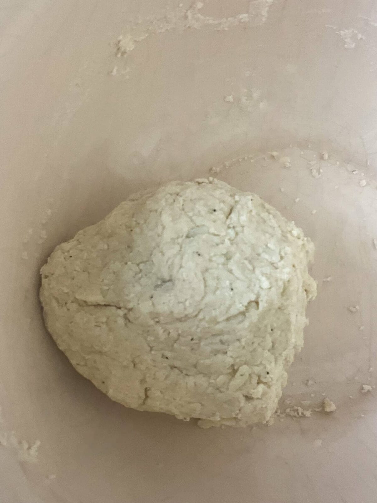 Large dumpling ball in mixing bowl.