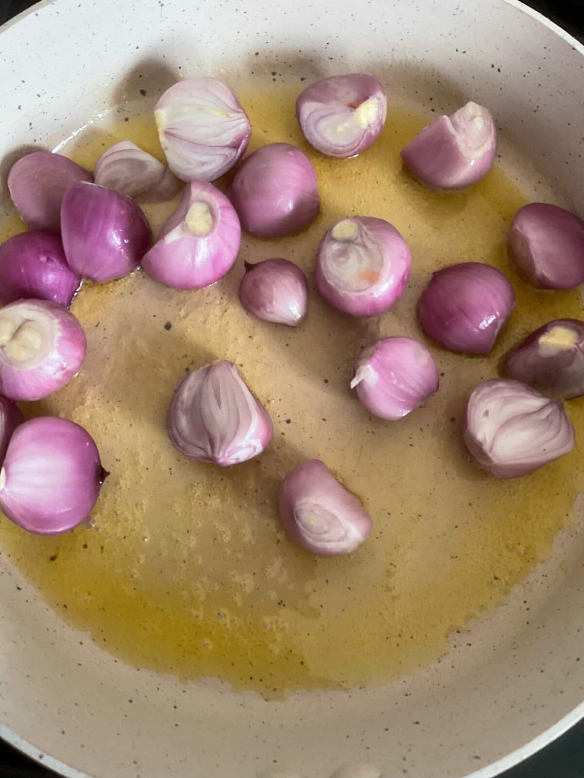 Shallots added to pan with melted butter.