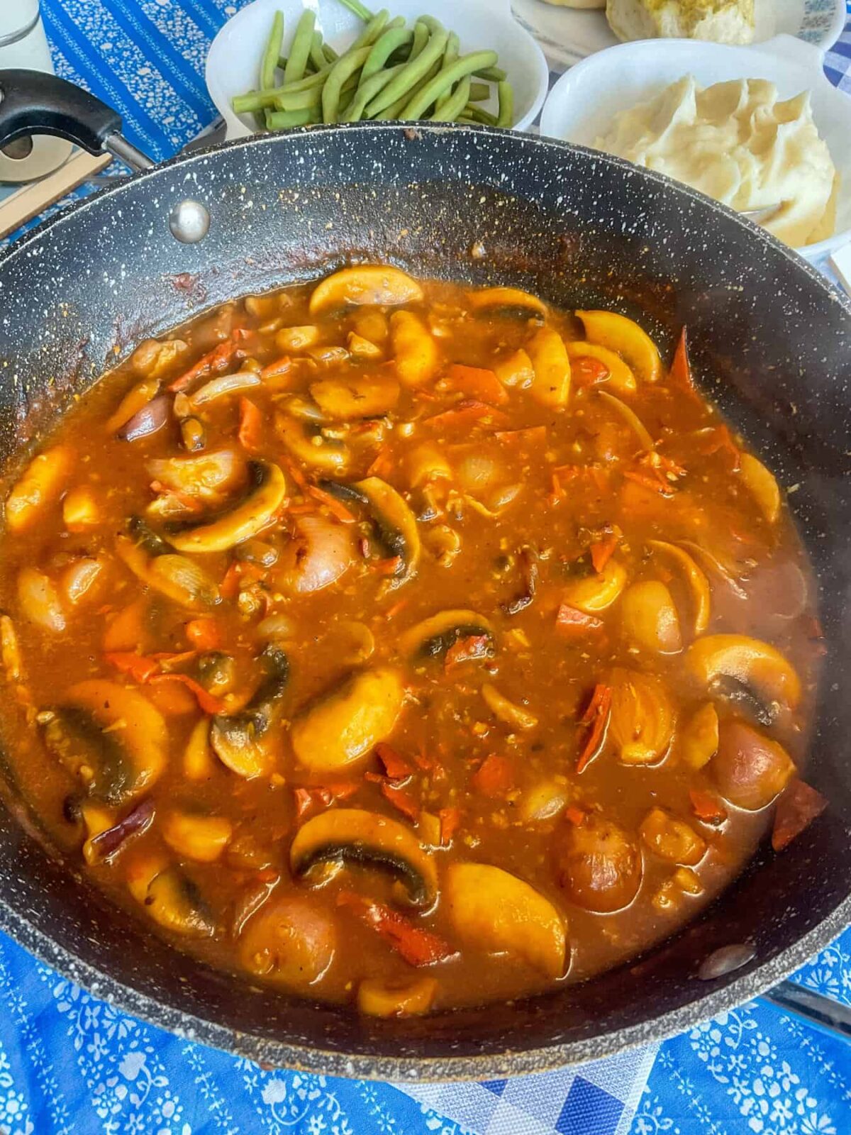 Coq au vin sauce cooked and ready for the cauliflower steaks to be added.