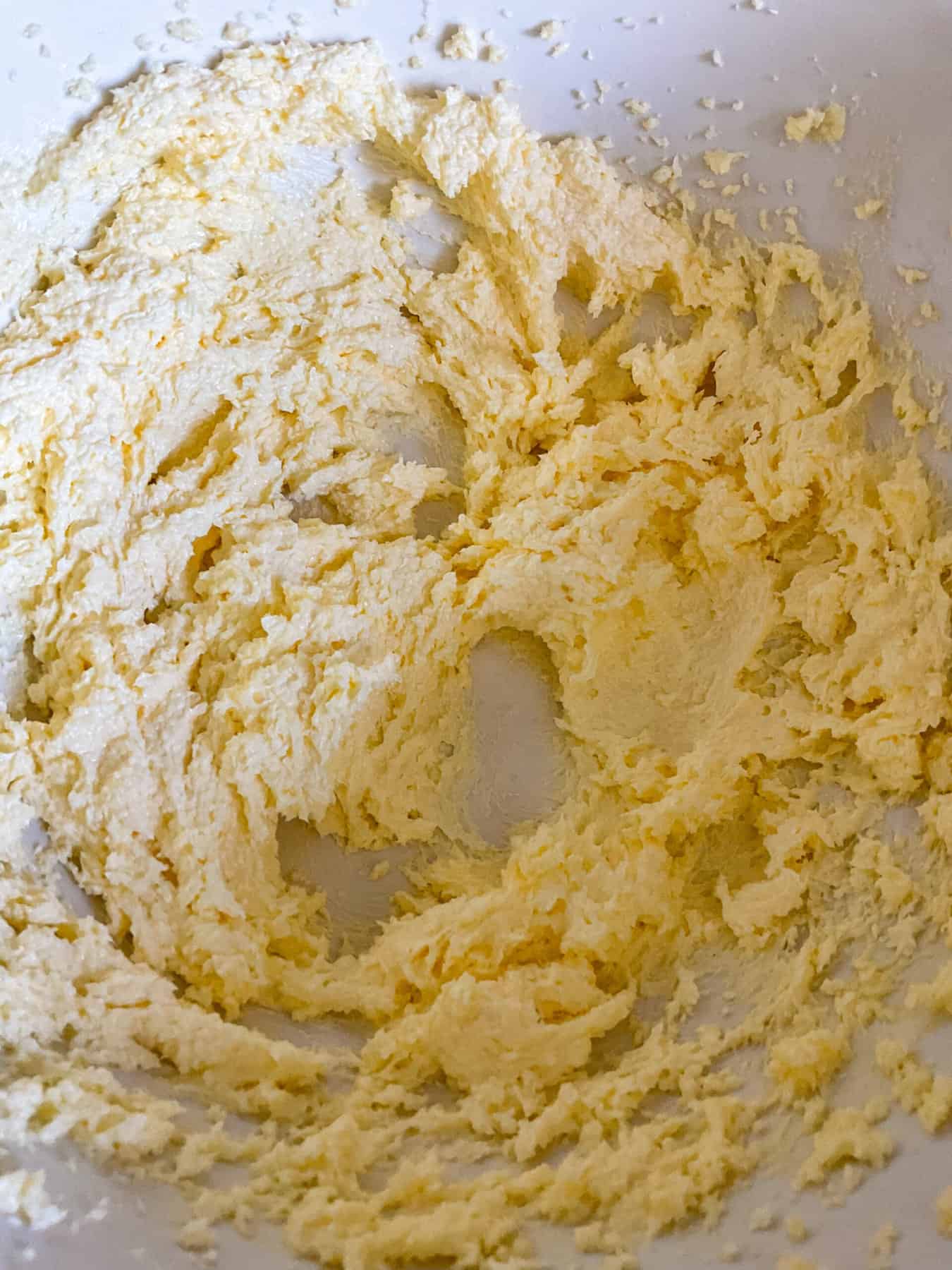 Margarine and sugar whisked together in mixing bowl.