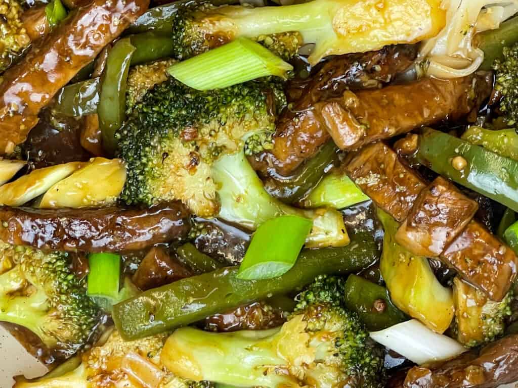 Mongolian beef and broccoli cooked and ready to serve, close up.