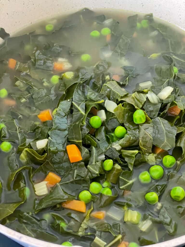 spring greens soup ready to serve in pot.
