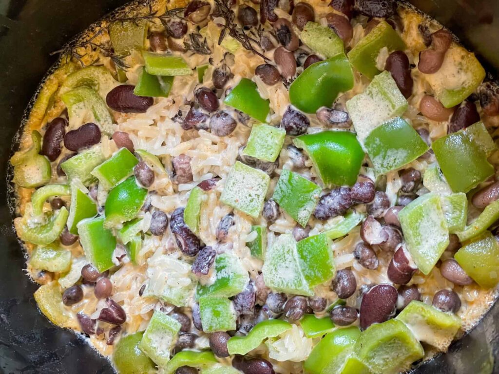 rice and peas cooked in the slow cooker and ready to stir.