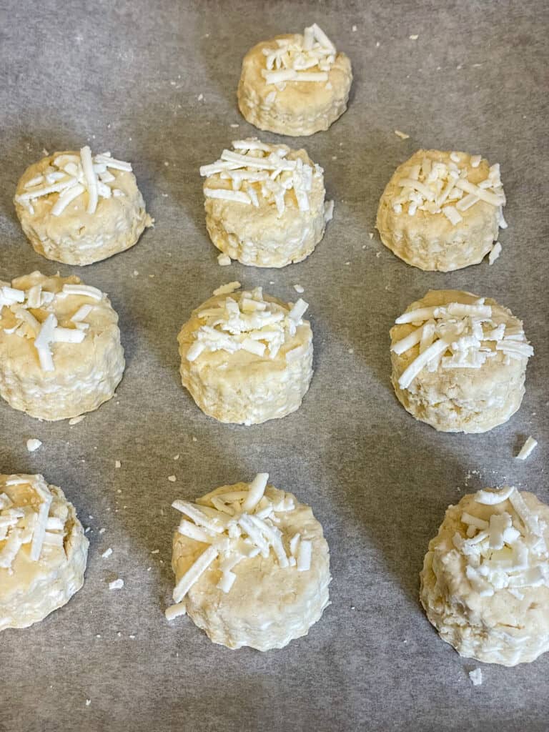 grated cheese over the unbaked scones.