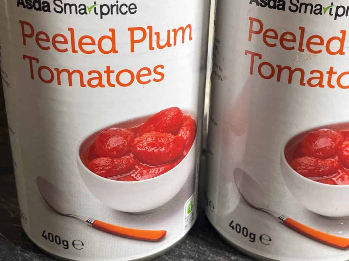 Two cans of plum tomatoes.