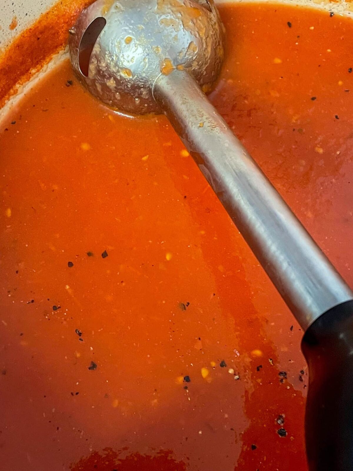 Soup blended in pot with stick blender.