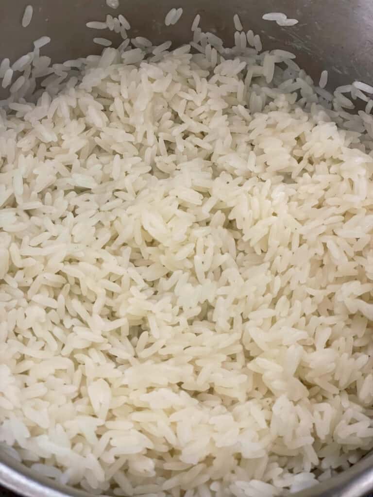 rice cooked and ready to serve in the saucepan.
