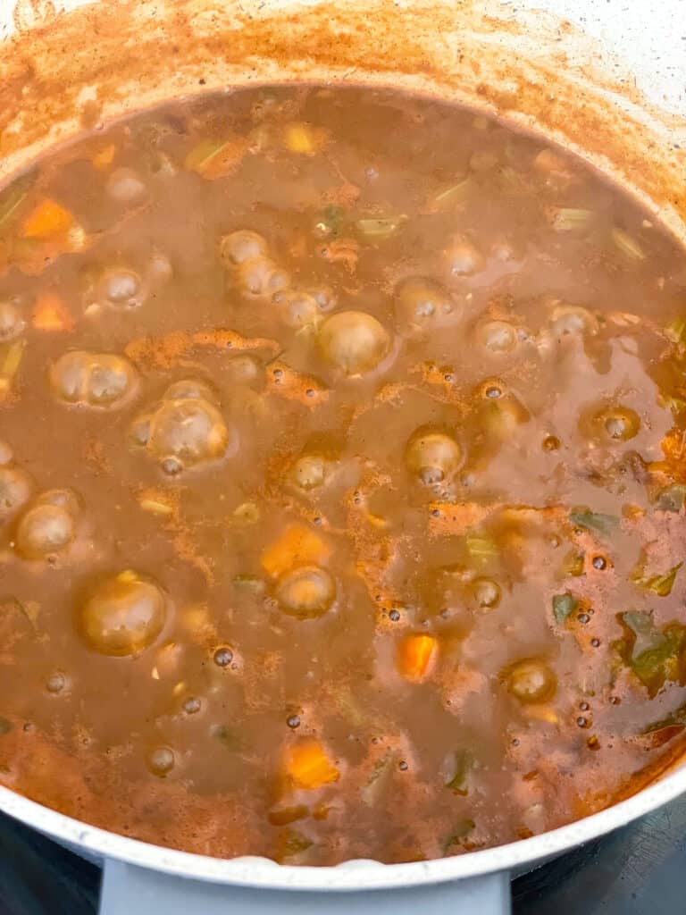 red beans stew simmering away in the large saucepan.