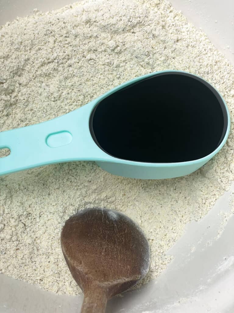 molasses in small measuring cup in mixing bowl.