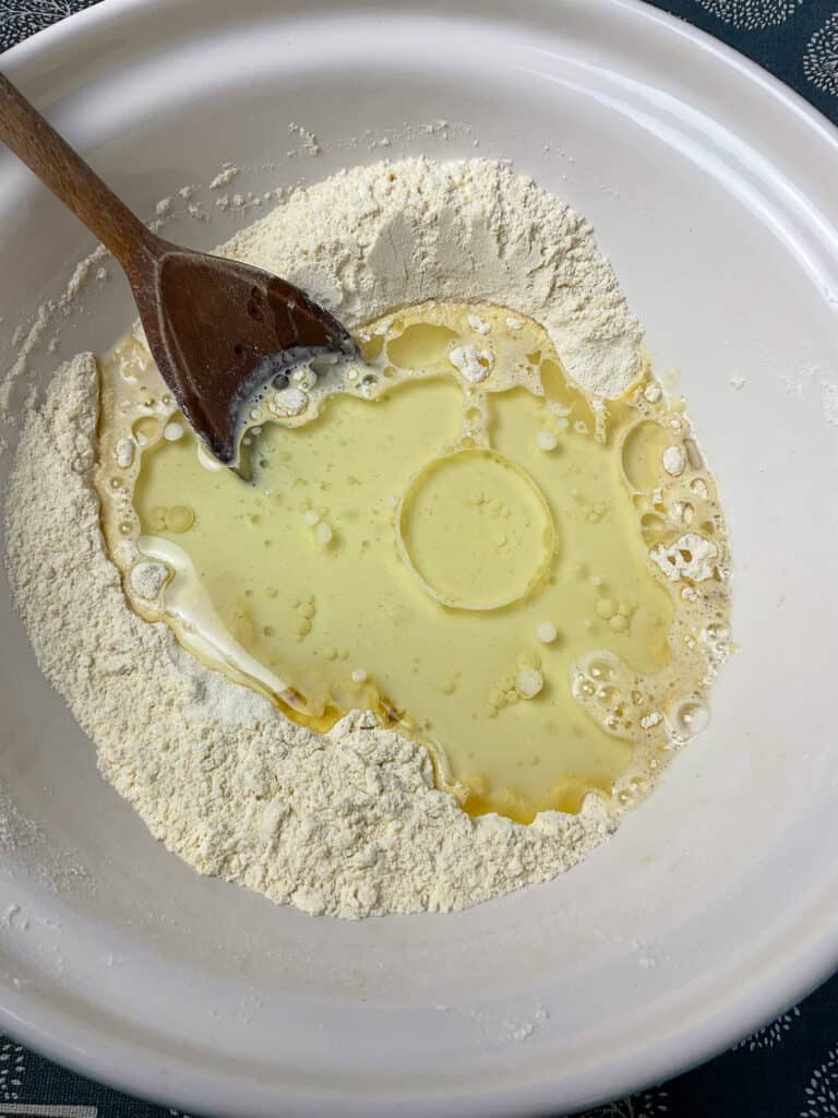 wet ingredients added to dry in mixing bowl.