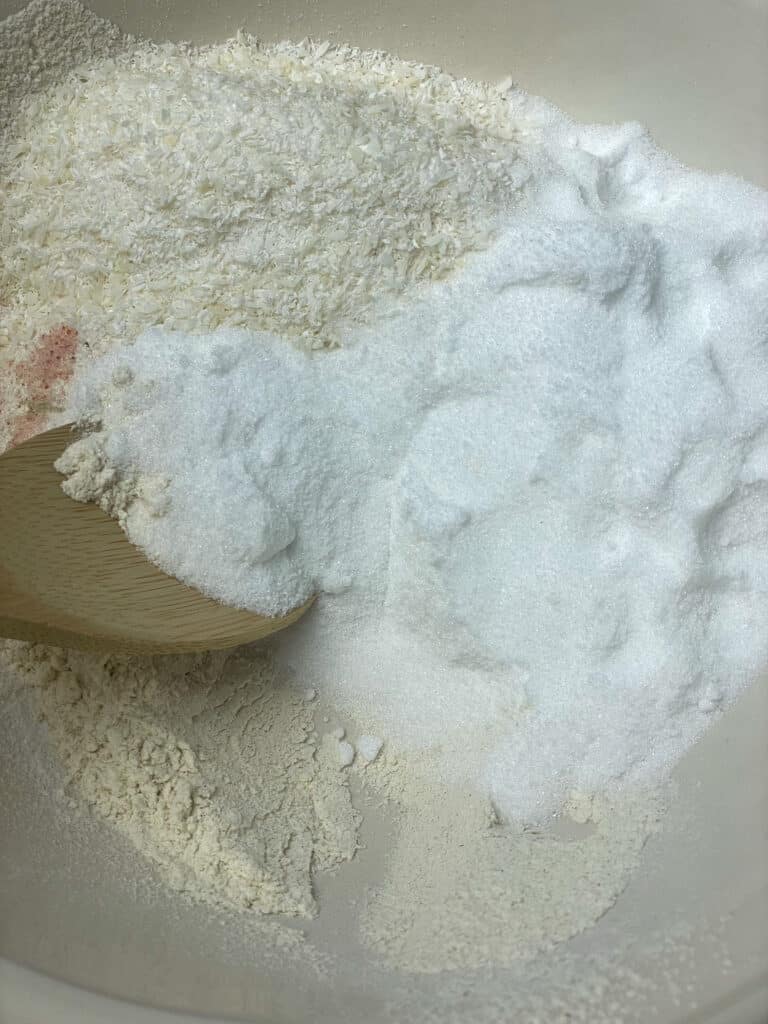 dry ingredients for coconut buns, in mixing bowl.