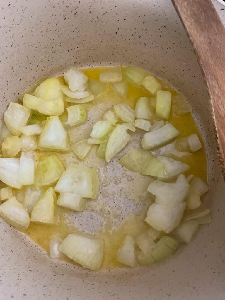 onions sauteing in soup pot for pea soup.