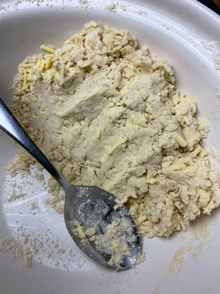 soya milk added to flour mixture and brought together into a scone dough.