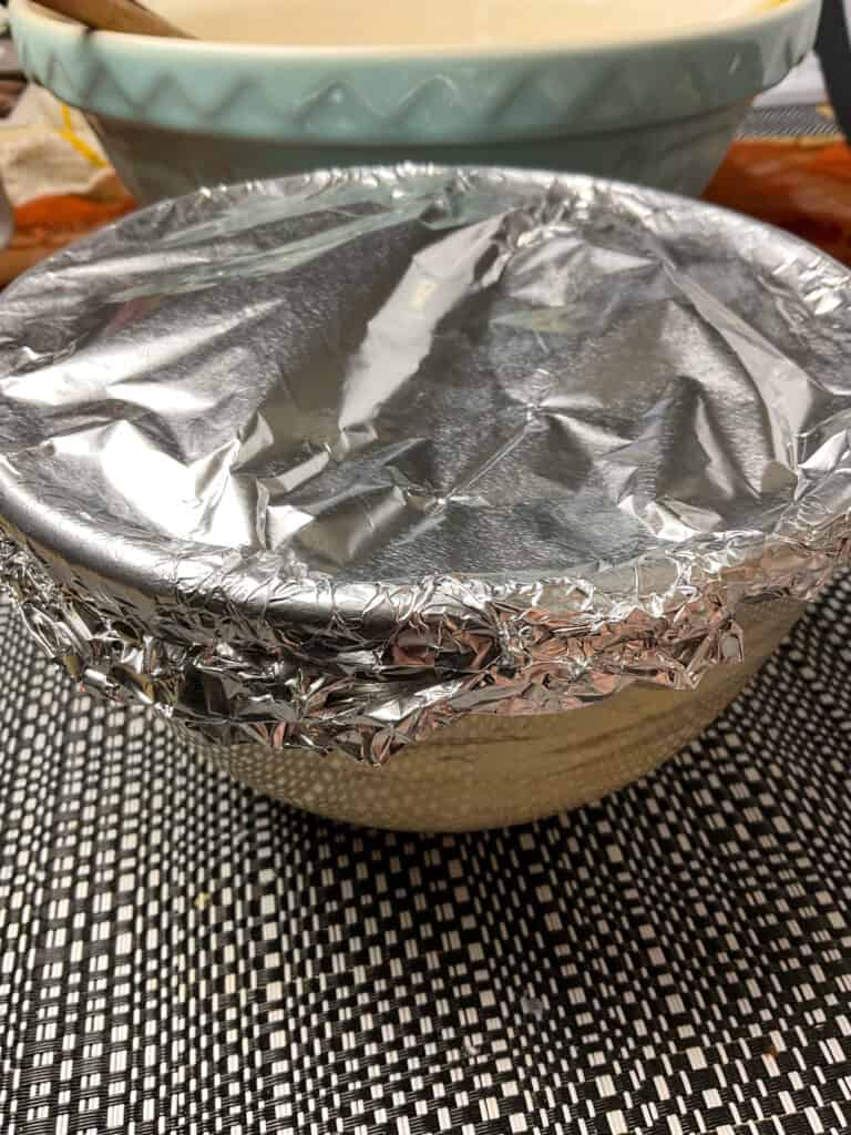kitchen foil lid added to pudding basin.