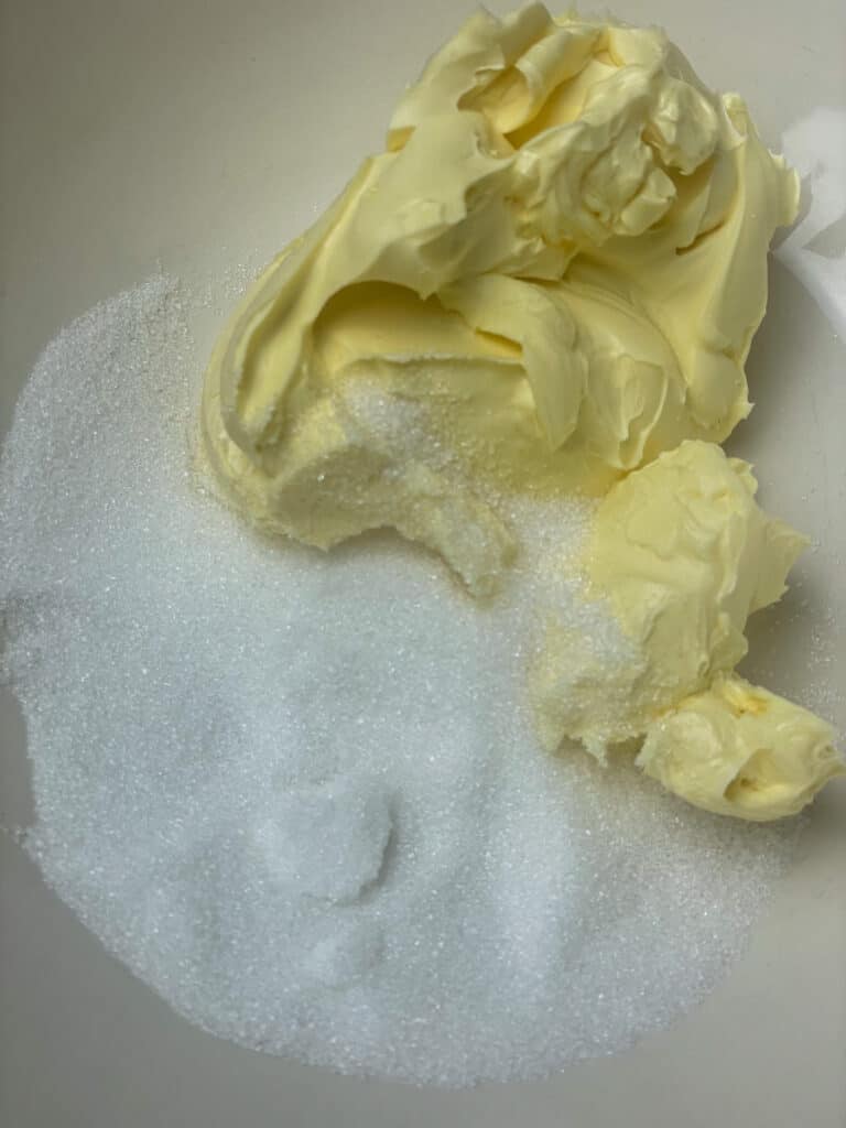 sugar and margarine added to mixing bowl.