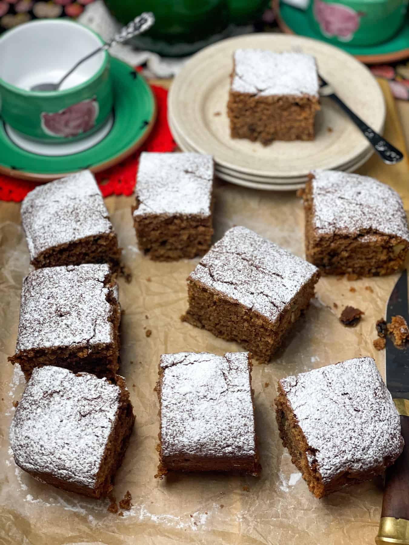 Slices of applesauce cake on table.