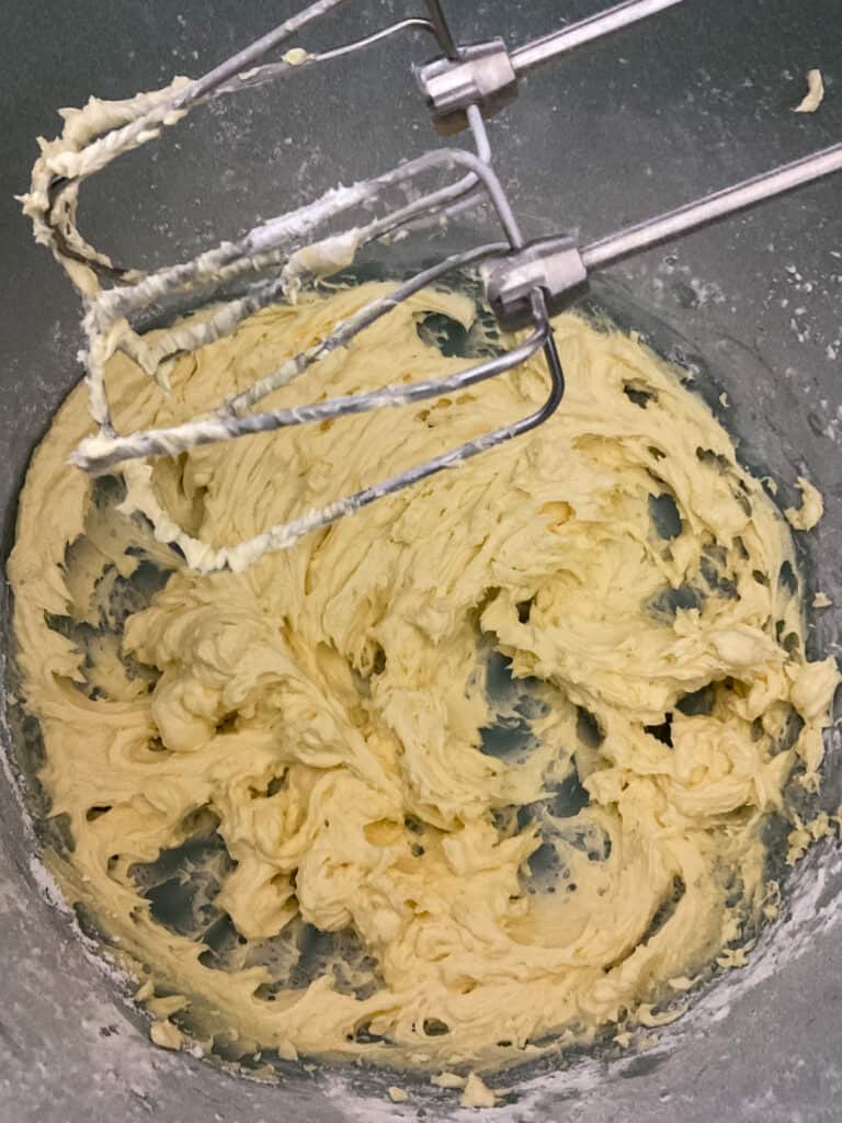 brandy butter ingredients mixed with electric hand whisk.