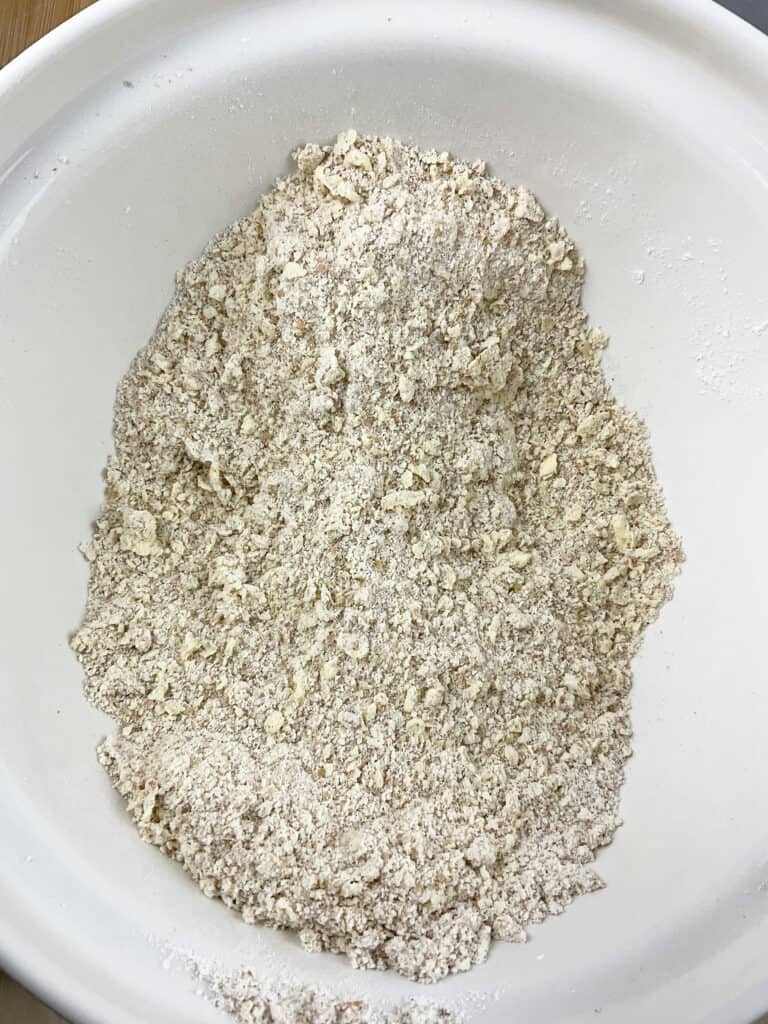 Flour and margarine rubbed into breadcrumb mixture.