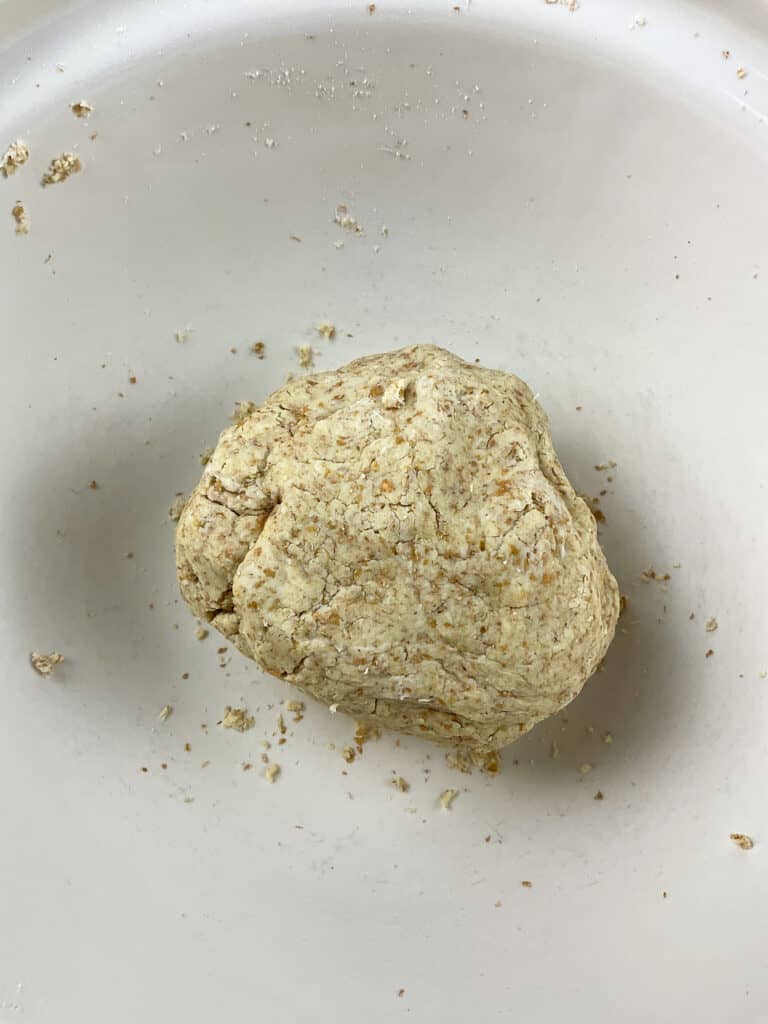 pastry dough in a ball in the mixing bowl ready to be chilled before use.