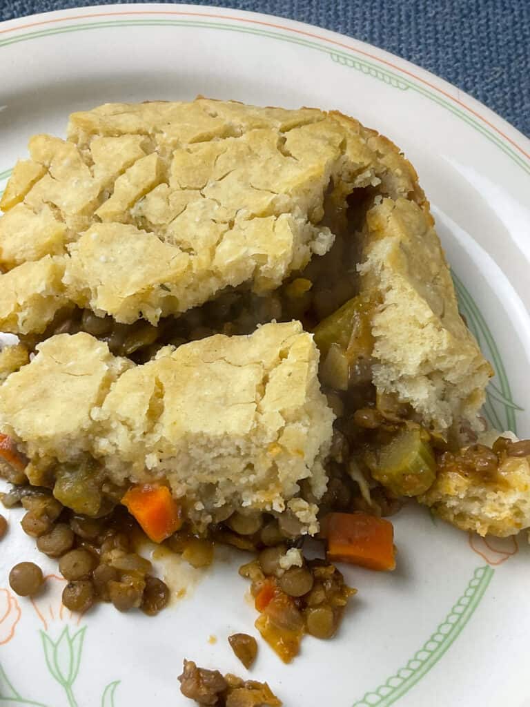 A portion of vegan Teviotdale pie on a dinner plate.