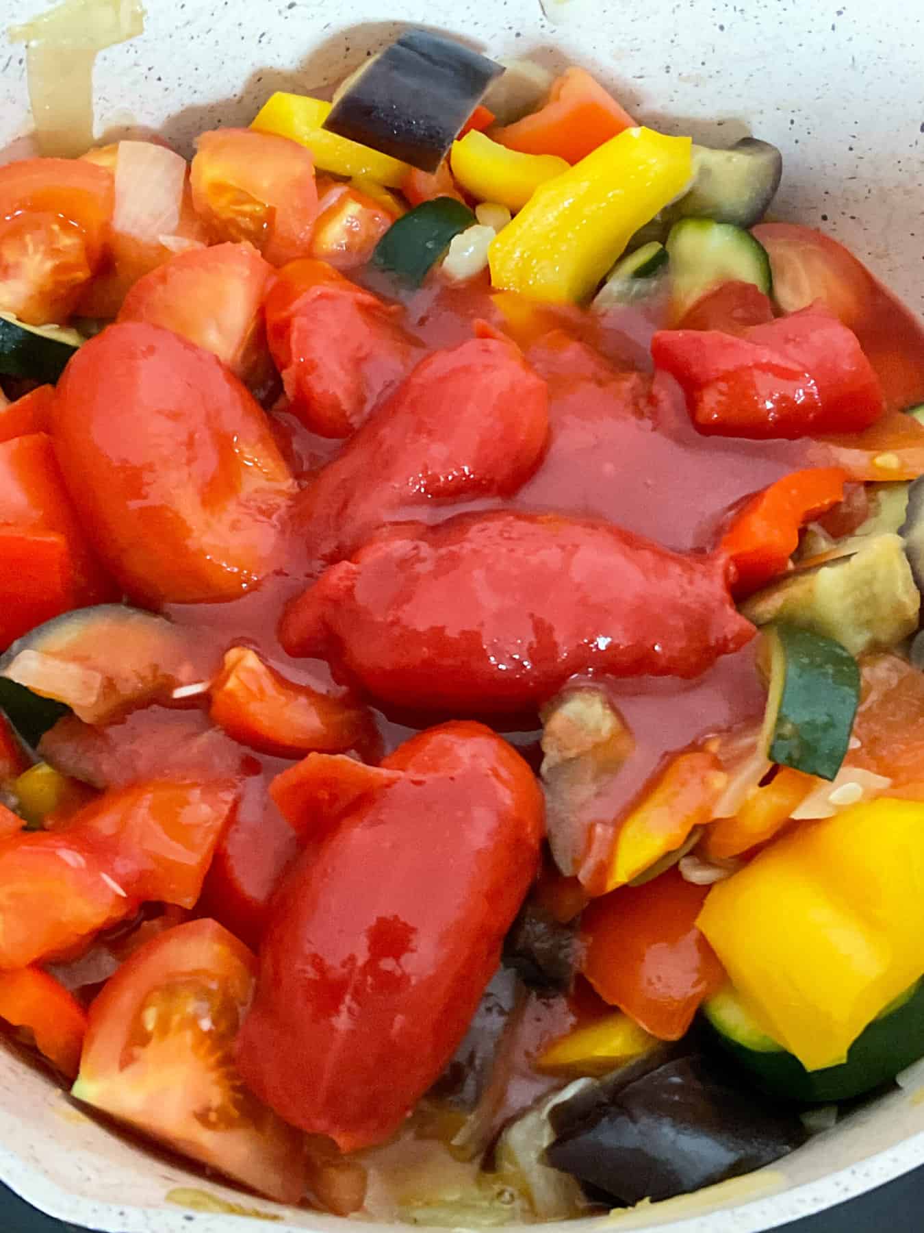 canned plum tomatoes added to ratatouille.