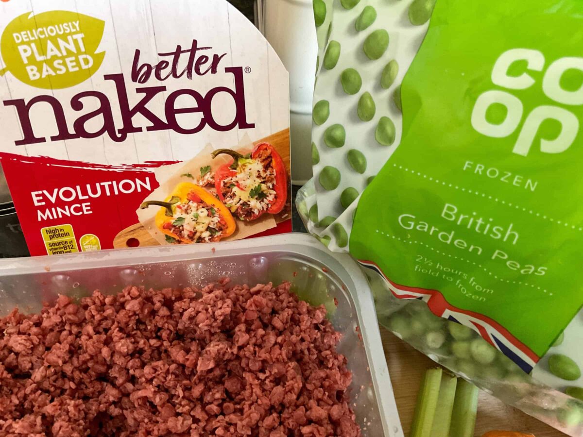 A photo of naked Evolution plant based mince package and a bag of frozen green peas, ingredients for chuck wagon stew.