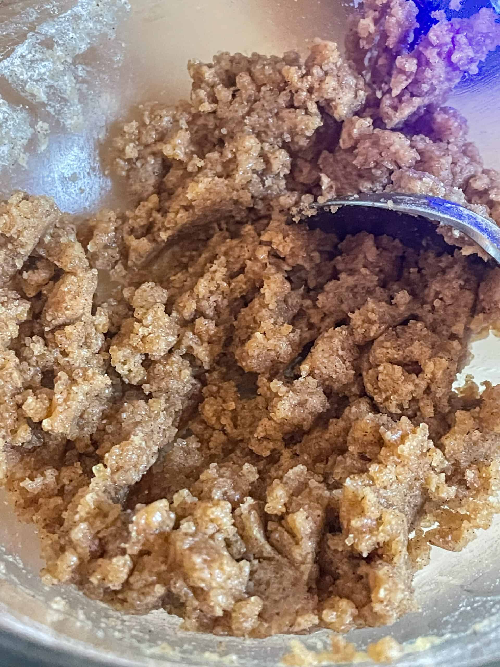 Crumble topping ingredients stirred together and formed into a crumble.