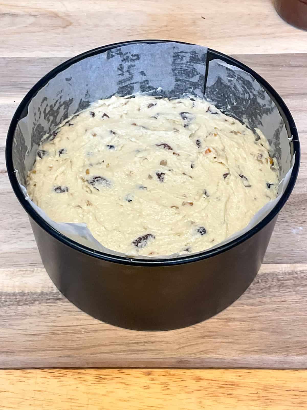 Unbaked cake mixture in cake pan.