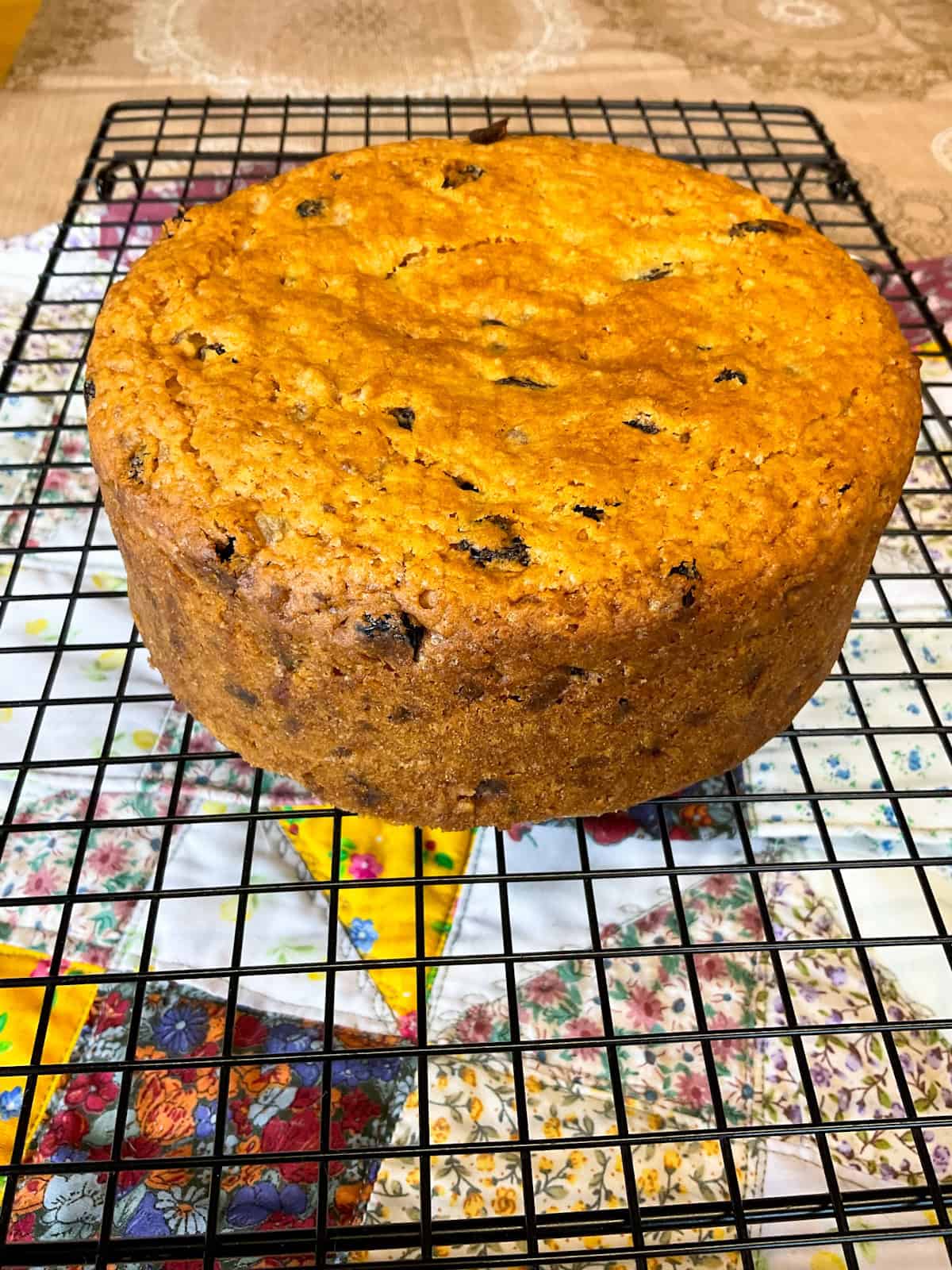 Baked cake removed from pan and on cooling rack.