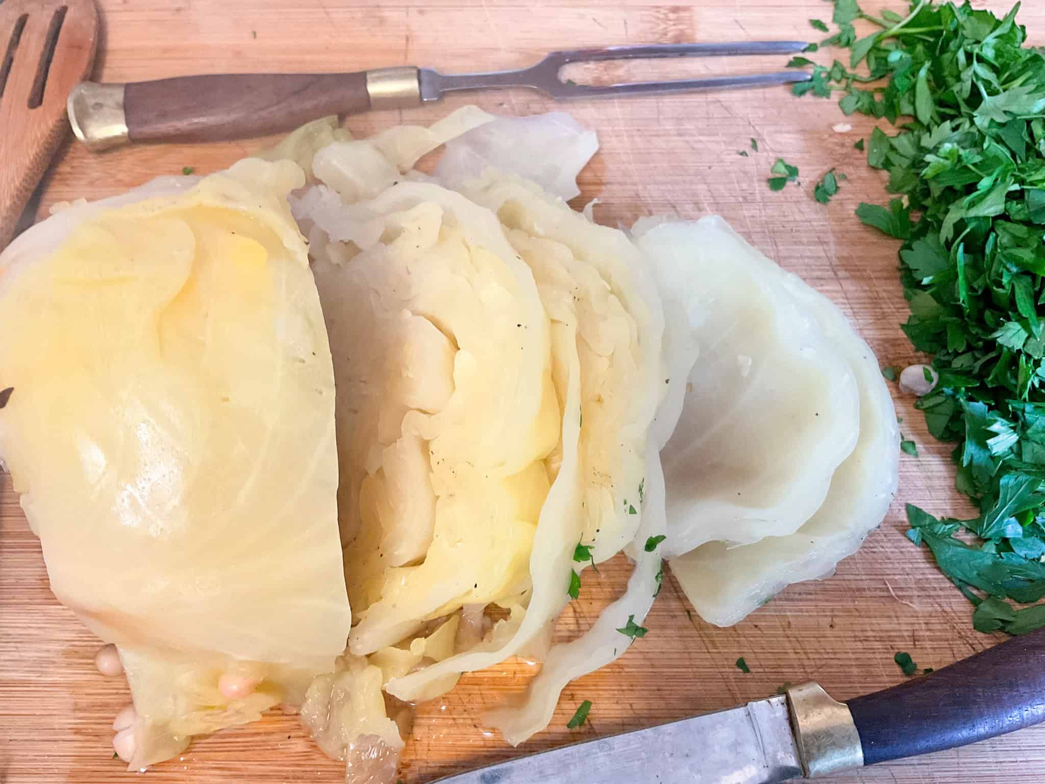 Cabbage carved on chopping board.
