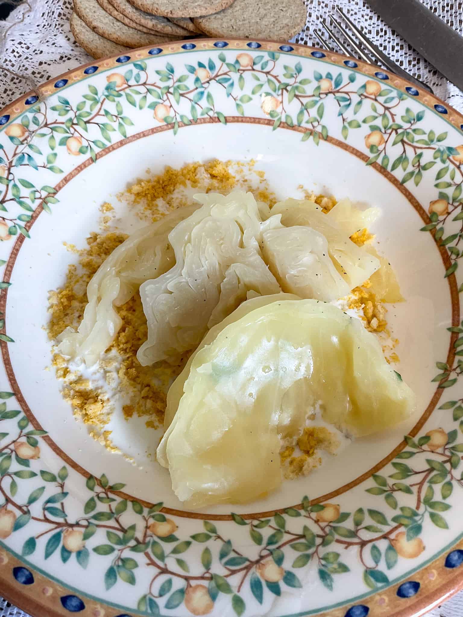 Cabbage slices added to bowl.