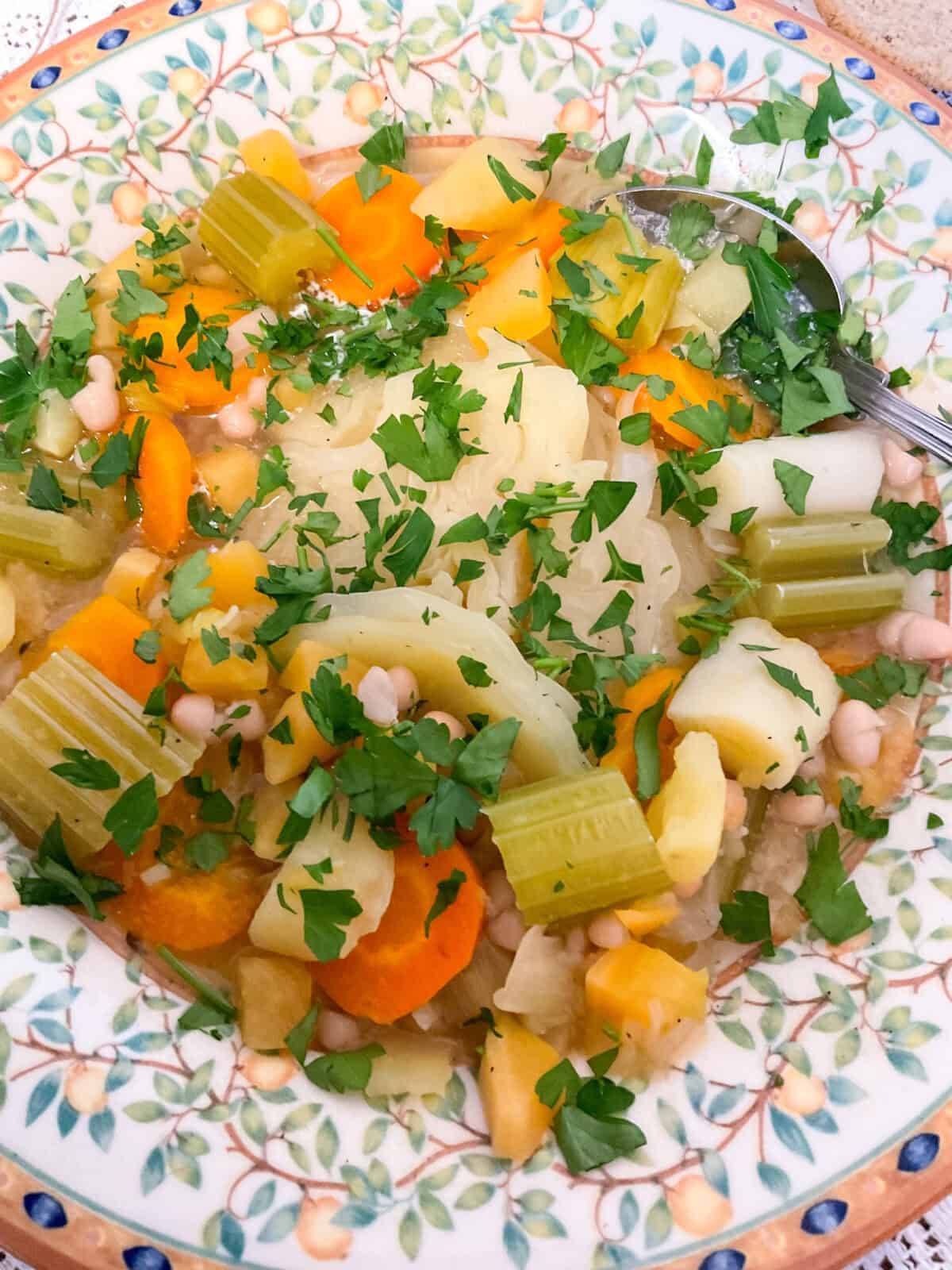 Close up image of pottage on serving bowl.