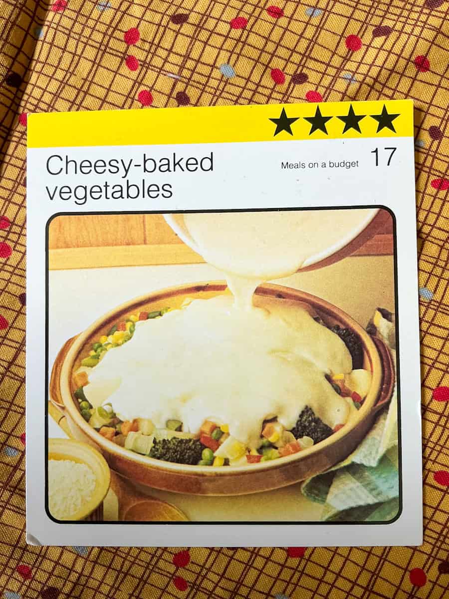 Image of cheesy baked vegetables recipe card.