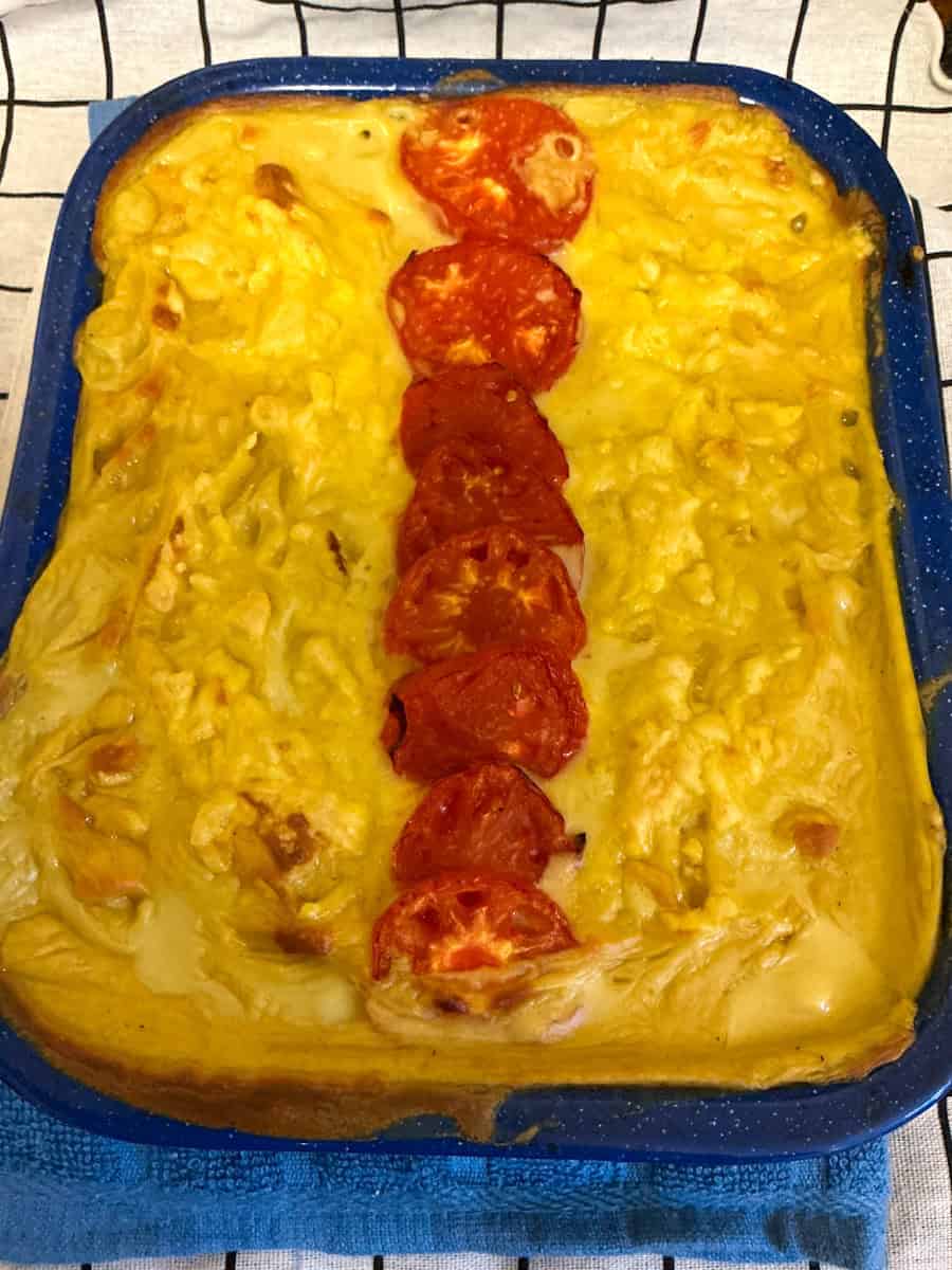 Vegan macaroni cheese baked and in pan.