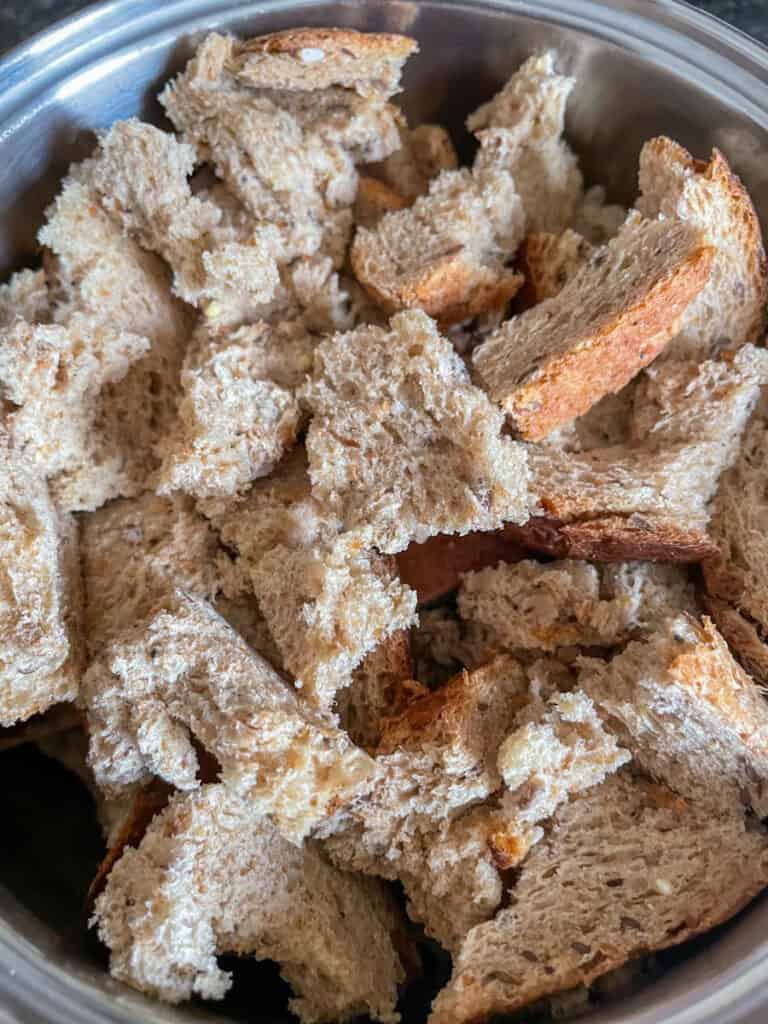 Bread chunks in bowl.