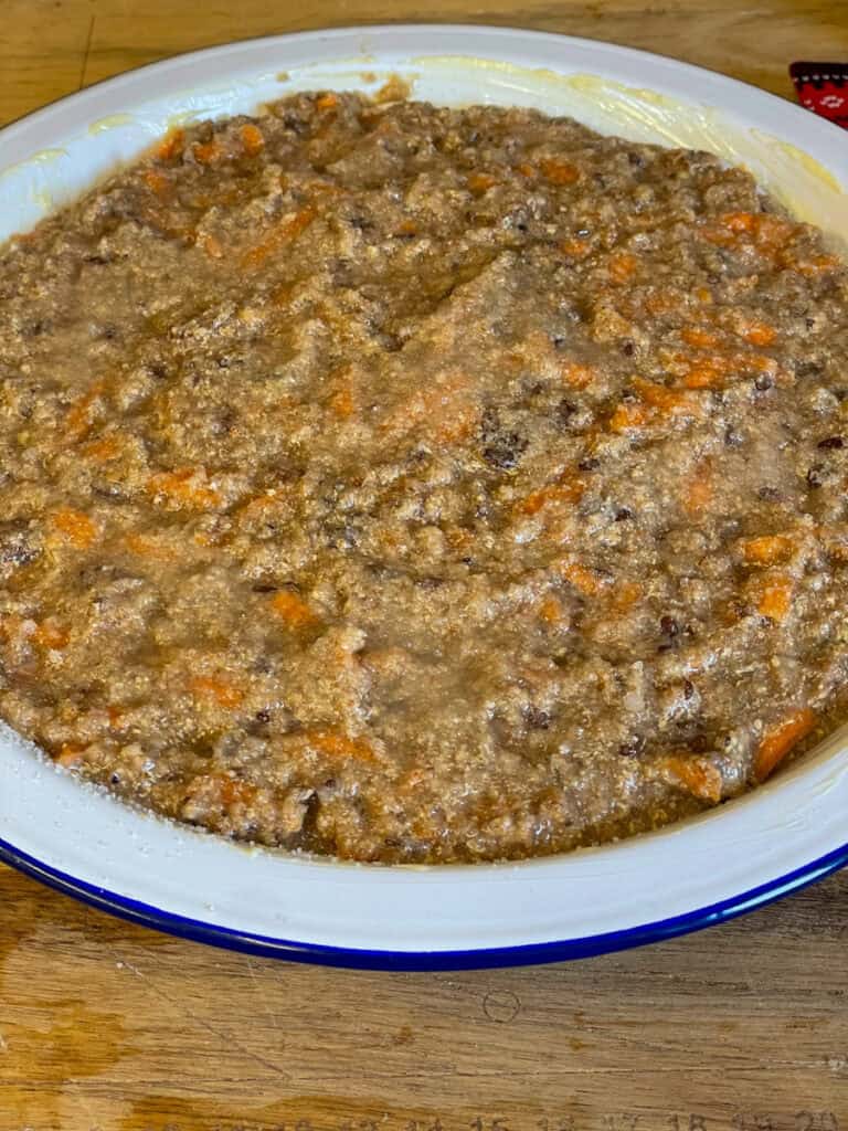 Pudding mixture added to pie dish.